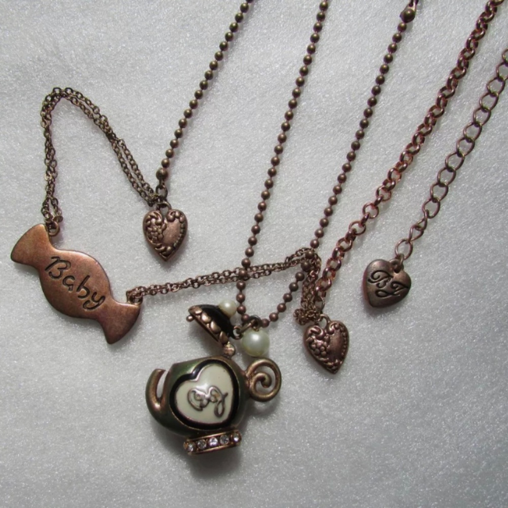 Vintage copper toned Betsy Johnson charm necklace